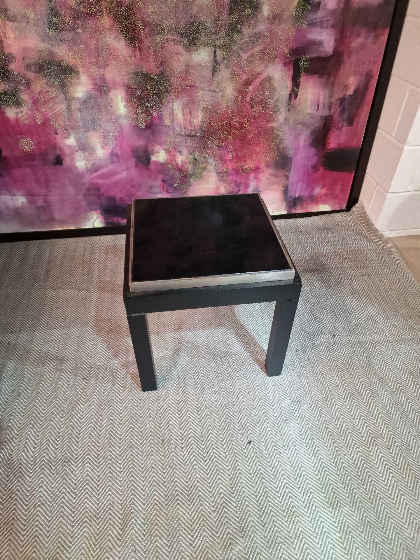 A pair of side tables ebony black timber frame with a framed black glass top 50 x 50 50cm