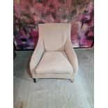 A pair of contemporary linen cream upholstered lounge chairs with wooden legs 74 x 56 x 85cm