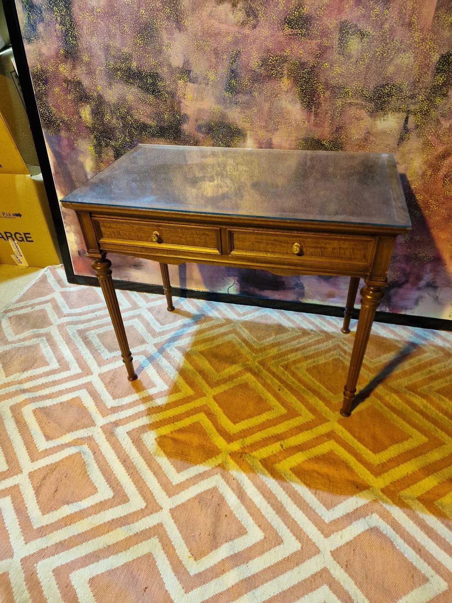 Edwardian style writing table with tooled leather top with two frieze drawers standing on turned