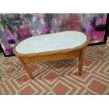 Coffee table oak oval table with a white marble top inset enhanced by silver metal trim 100 x 55 x