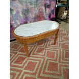 Coffee table oak oval table with a white marble top inset enhanced by silver metal trim 100 x 55 x