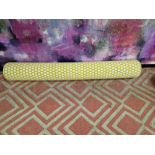 7 x yellow and white patterned upholstered bolster cushions 60cm