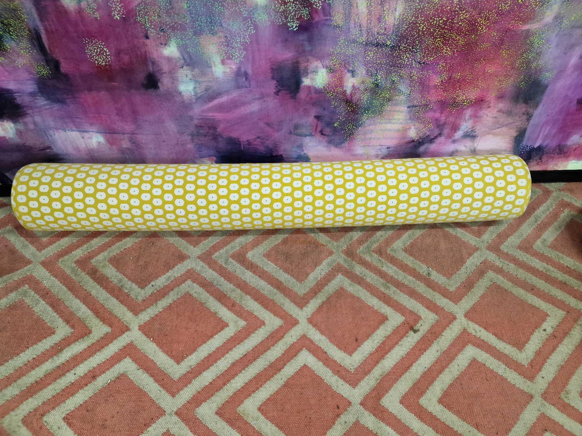 7 x yellow and white patterned upholstered bolster cushions 60cm