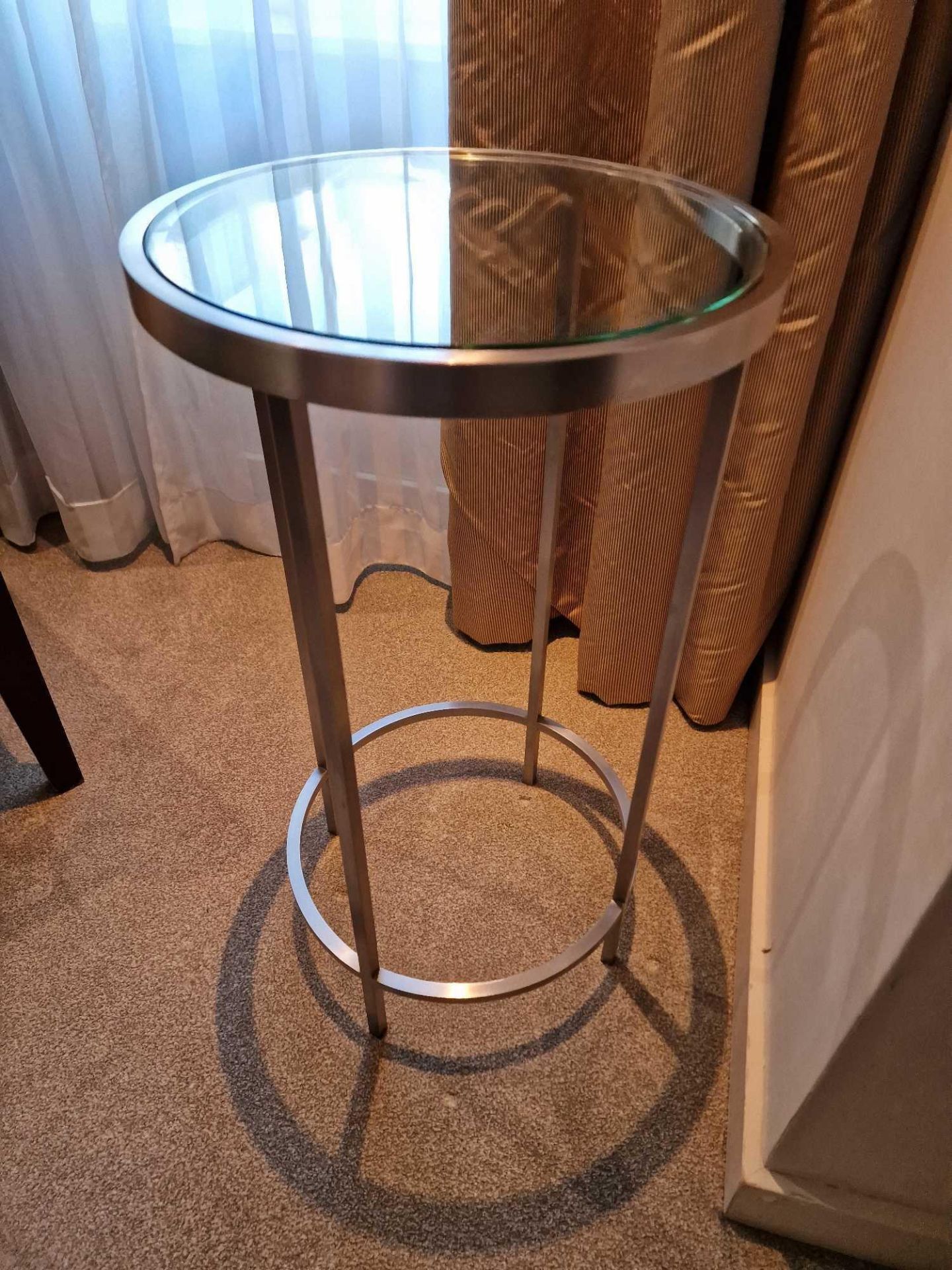 A Modern Design Stainless Steel And Tempered Glass Side Table 35cm Diameter x 64cm Tall