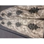 A pair of silk drapes gold with black floral pattern fully lined pencil pleat top each panel 115cm