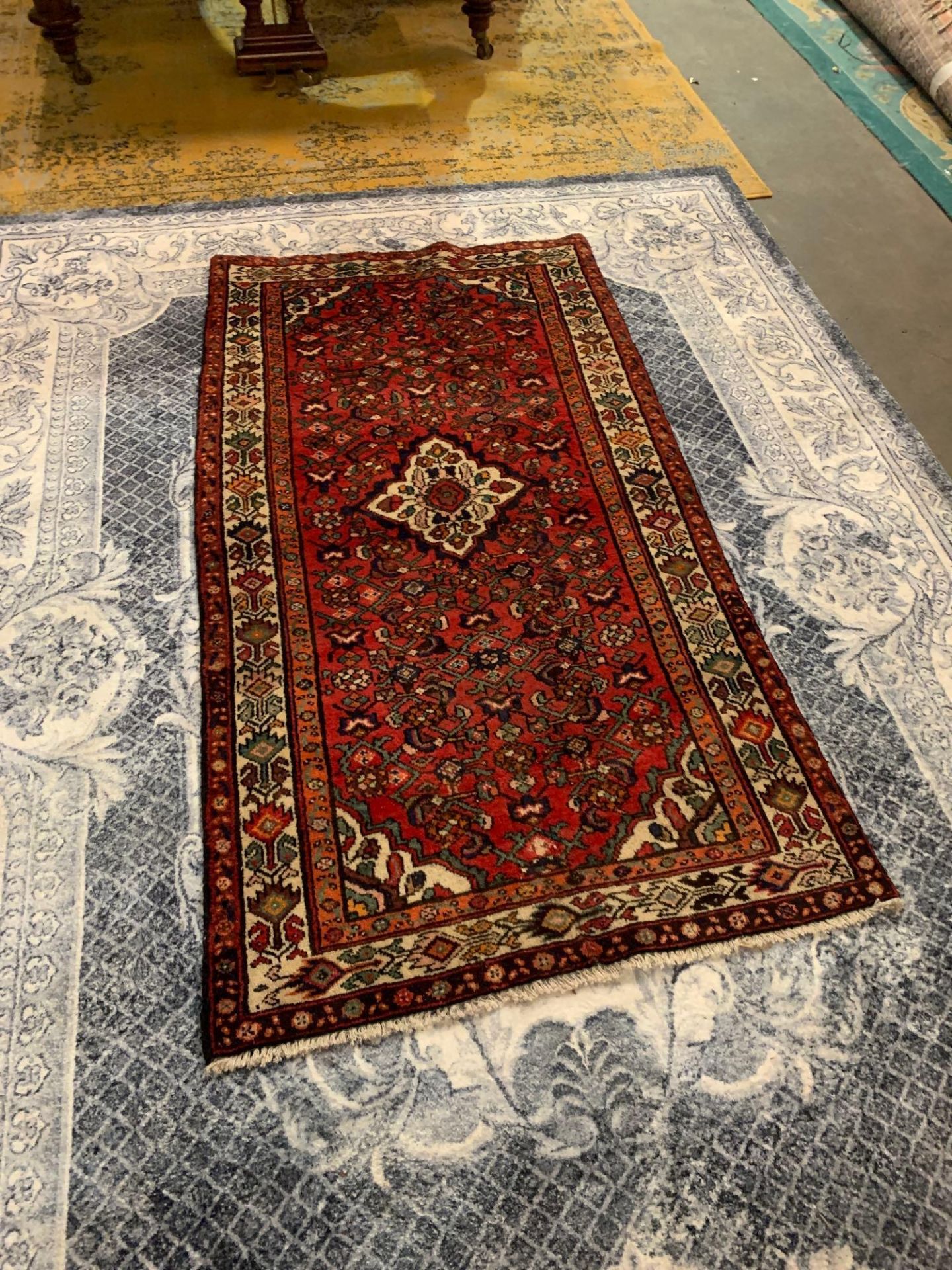 A Hamadan Rug, West Persia, Wool On Cotton Foundation. The Red Field With A Central Ivory Rhombus