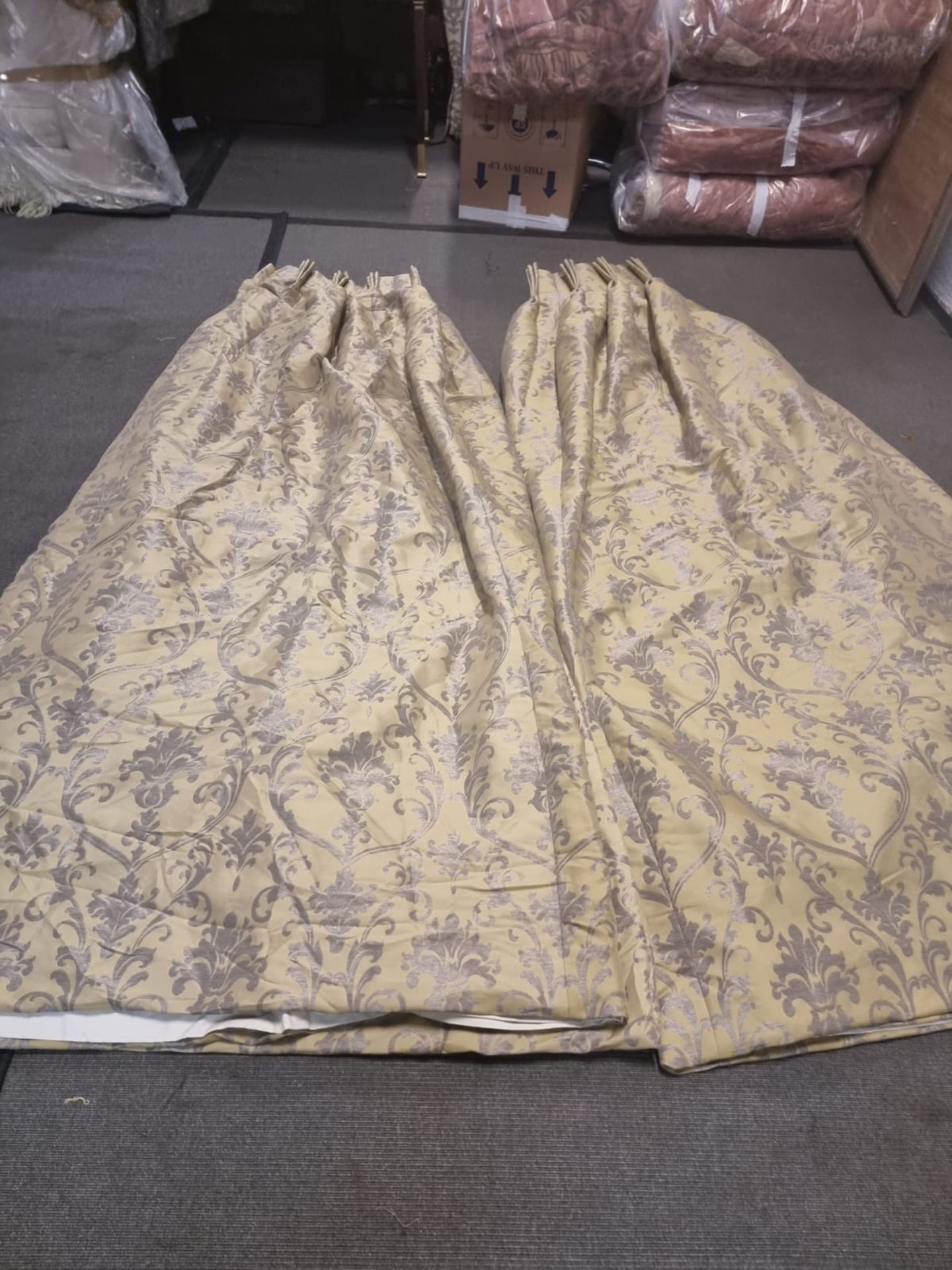 A pair of silk gold and silver floral pattern drapes fully lined pencil pleat top each panel 225cm