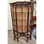 Waring And Gillow A Fine Quality Serpentine Fronted Display Cabinet By The Renowned Cabinet