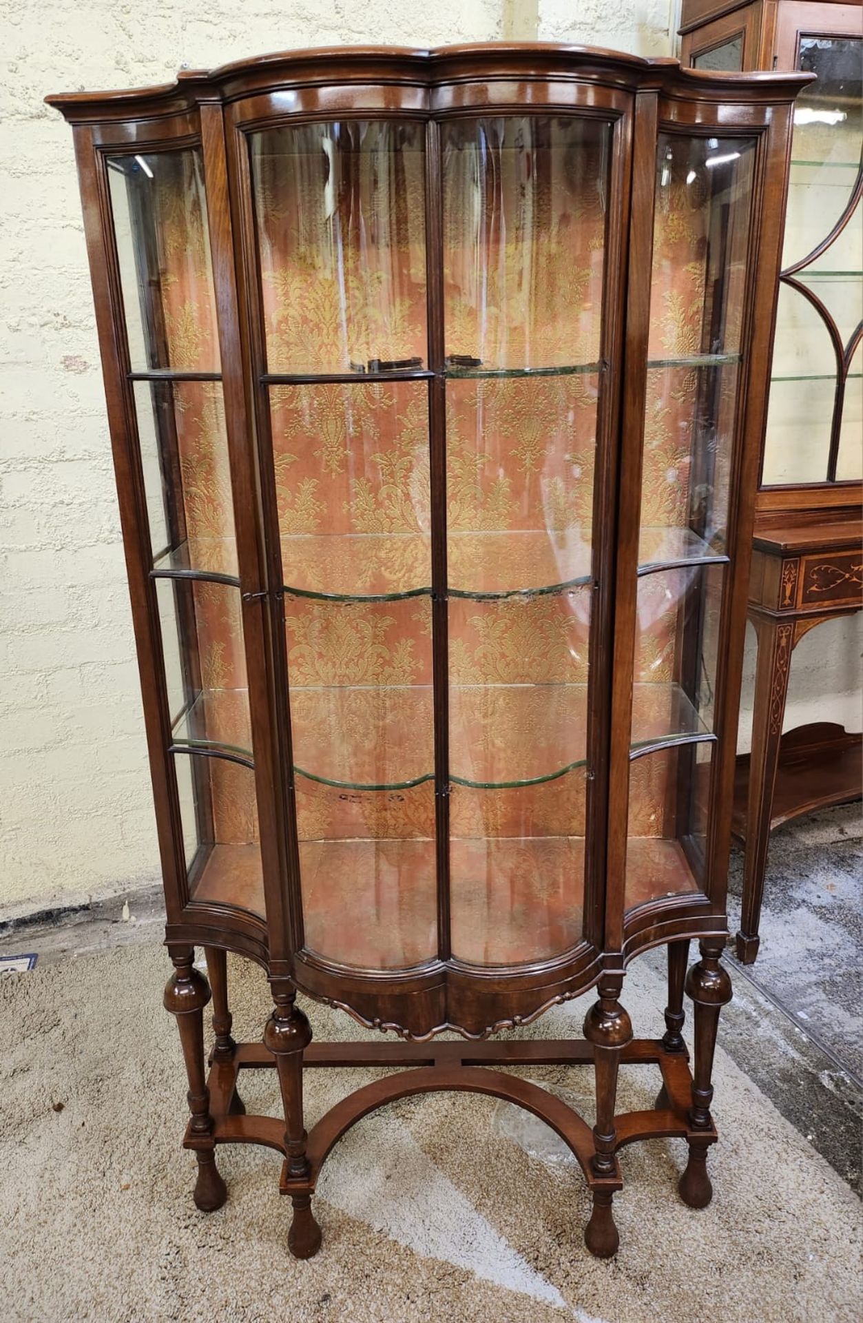 Waring And Gillow A Fine Quality Serpentine Fronted Display Cabinet By The Renowned Cabinet