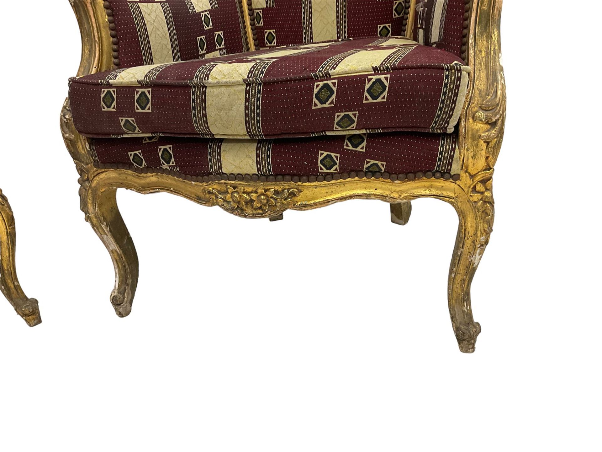 A Pair Louis XV design gilt framed wingback armchairs, the cresting rail carved and moulded with a - Image 7 of 10