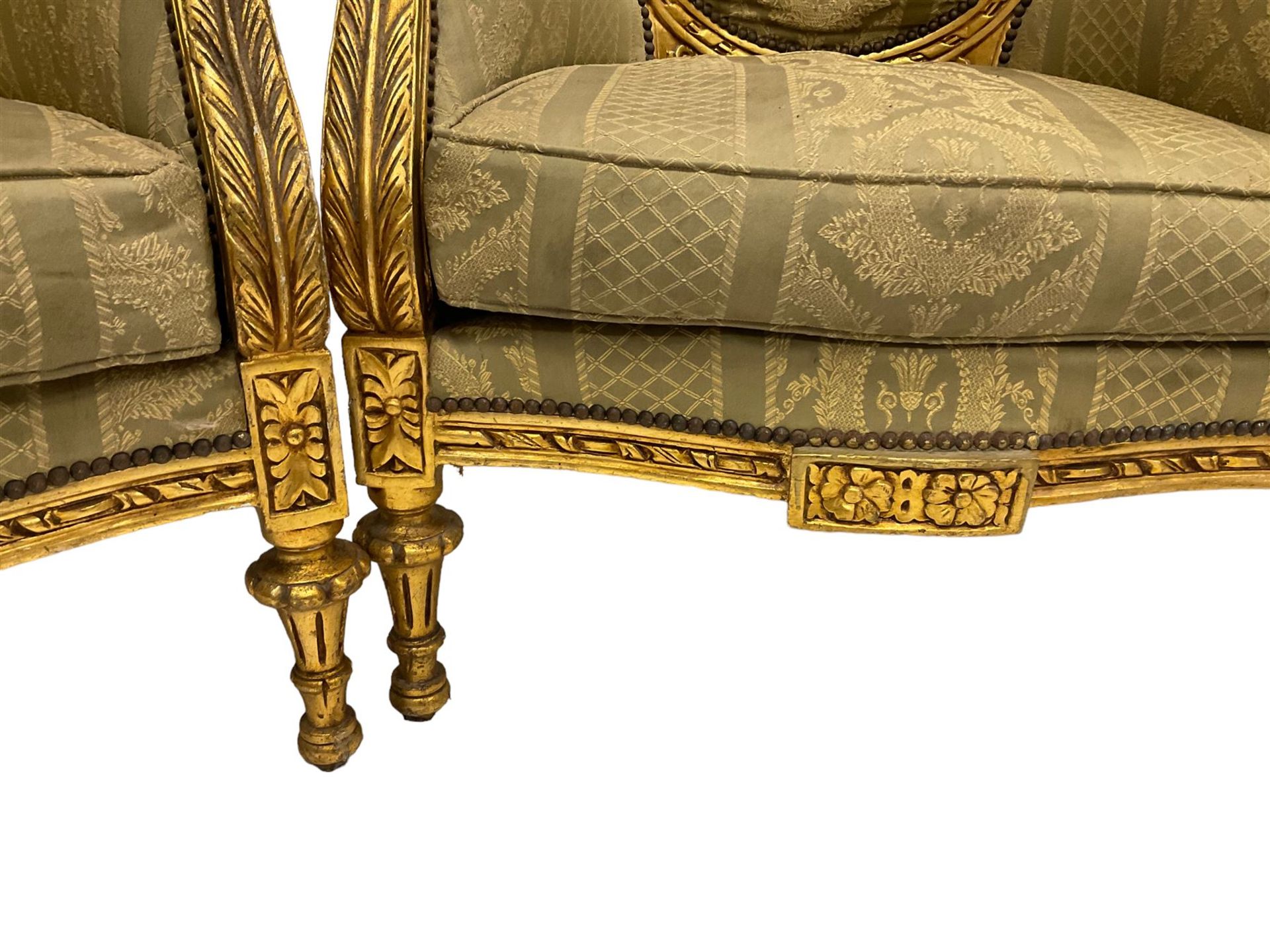 A Pair Louis XVI design gilt framed armchairs, the cresting rail pierced and moulded with flower - Image 7 of 8