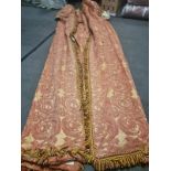 A pair of heavy cotton pencil pleat lined drapes with gold and red pattern with a pelmet top