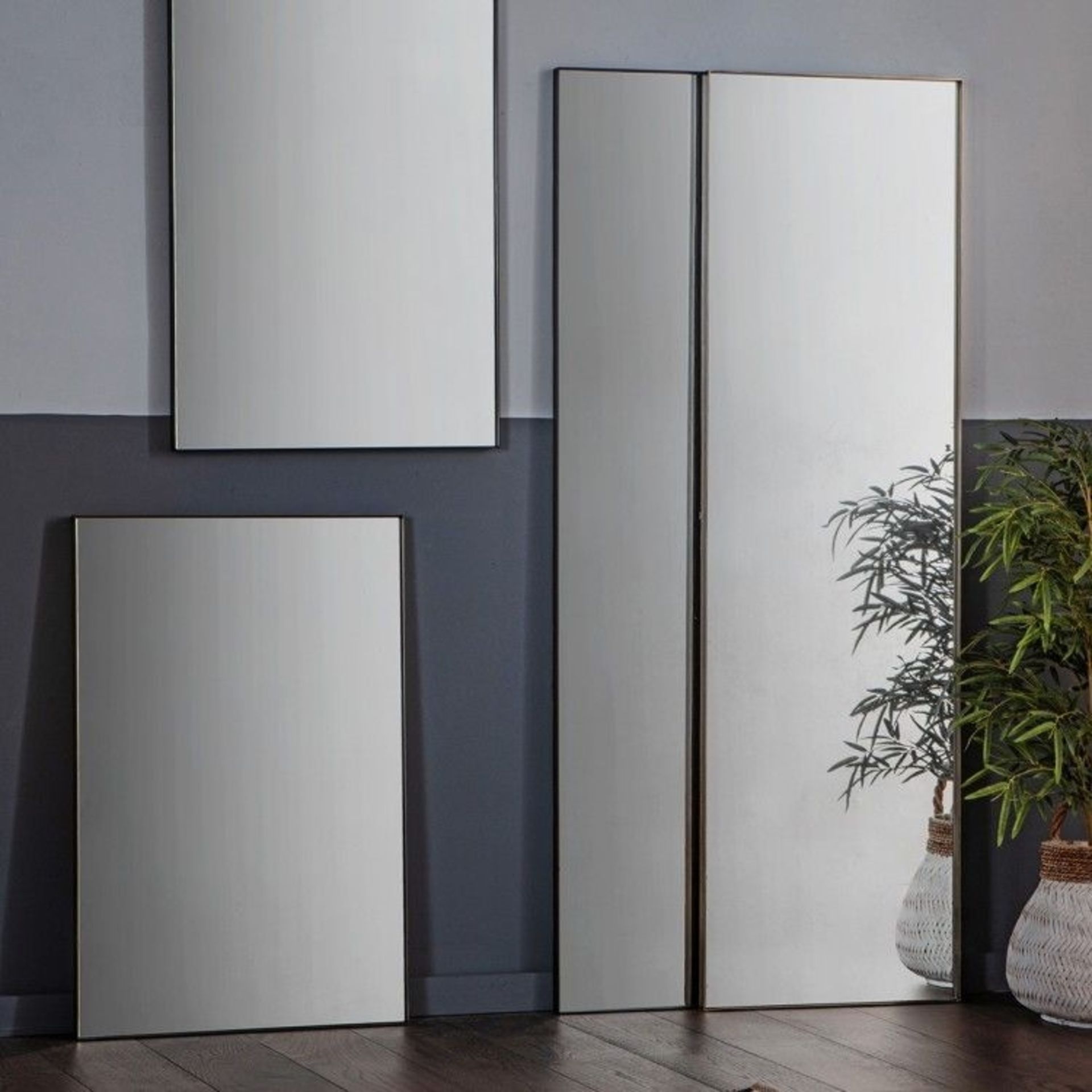 Hurston Leaner Mirror Bronze A beautiful rectangular wall mirror, with a stunning design made of a