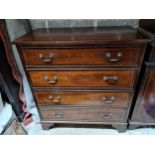 A Reproduction George III Style Mahogany Chest Of Drawers The Top With A Moulded Edge Over Four Long