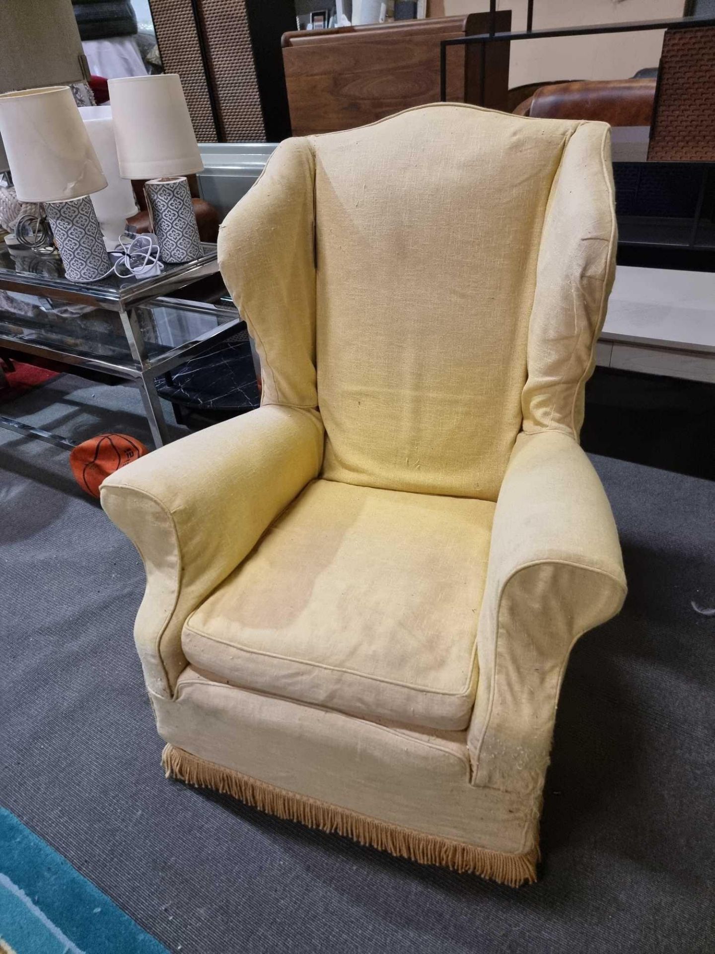 Wing Back Armchair Classic Styled Wing Arm Chair Framed And Upholstered In A Gold Yellow Cover