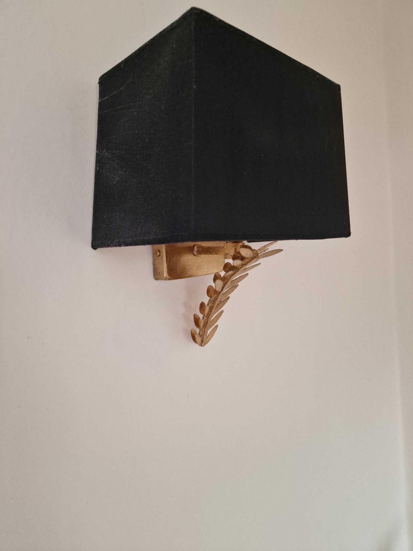 A Polished Brass Single Arm Wall Sconce With Leaf Decoration Complete With Black Box Shade 27cm
