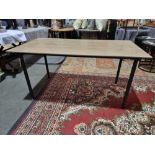 Modern Dining Table With Metal Frame Legs And Laminate Table Top Features A Modern Design With Its
