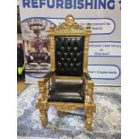 Handmade mahogany chair finished in painted matt gold upholstered in pinned black exceptional