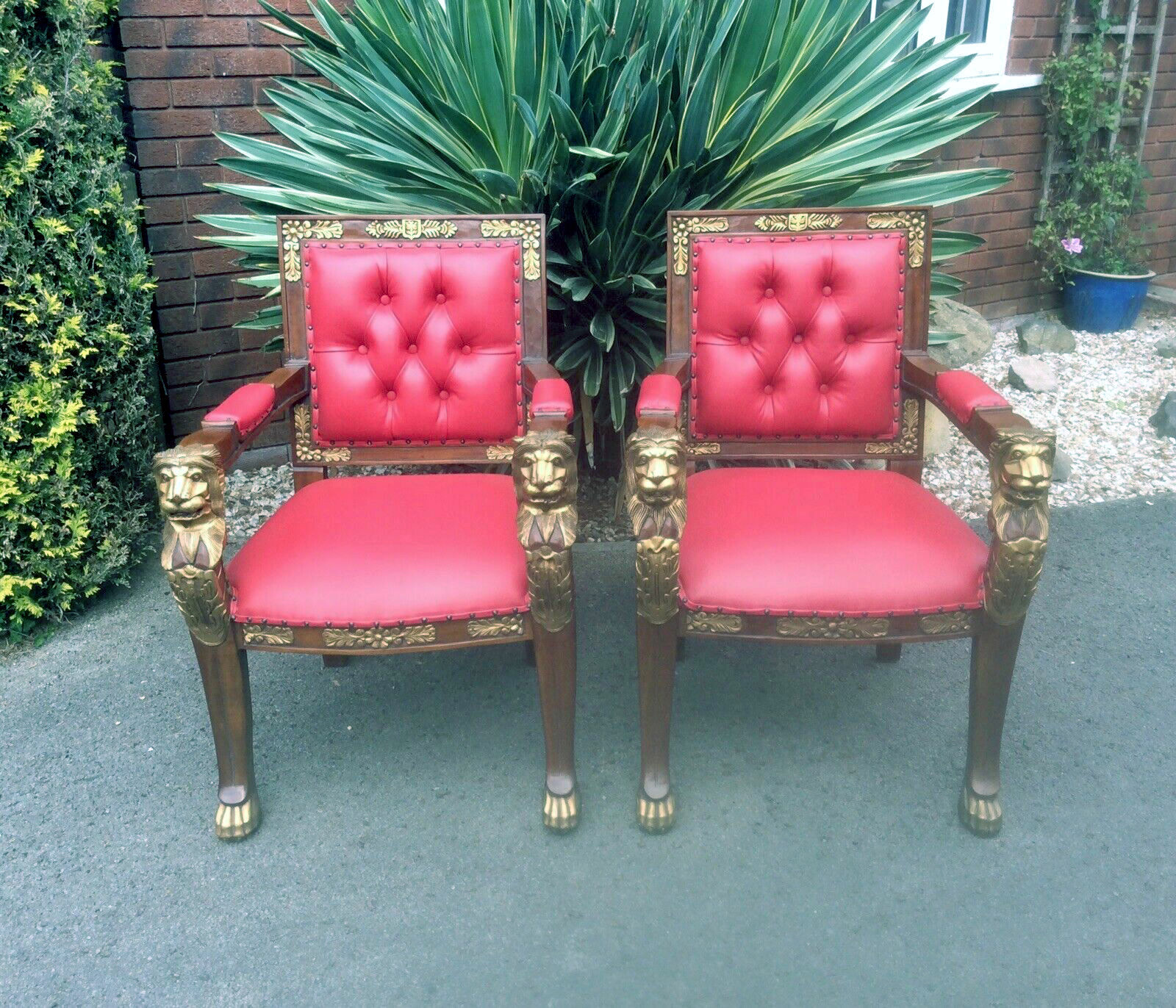 A Pair Of Regency Styled Carved Library Open Armchairs The Reeded Backs With Padded Arms And Seats