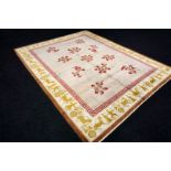 A Chinese Silk Carpet, Tientsin, Silk on Silk Foundation. The ivory field with a central column of