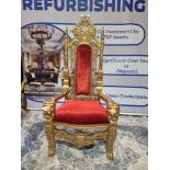 Handmade mahogany wood painted matt gold throne chair upholstered in a pinned red velvet exceptional