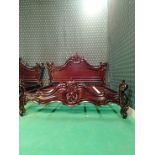 Bespoke mahogany bedframe hand carved ornate detail in the baroque style on the head and