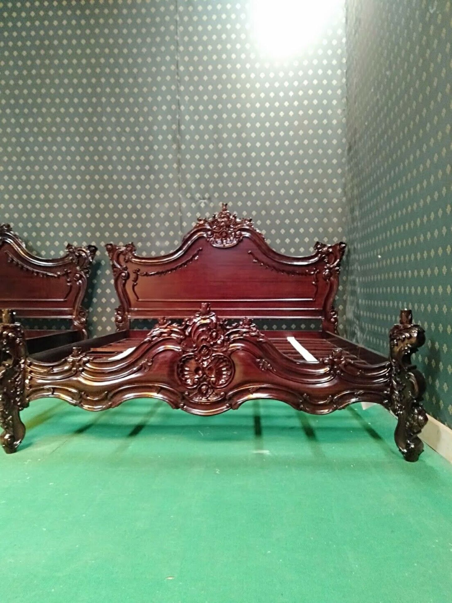 Bespoke mahogany bedframe hand carved ornate detail in the baroque style on the head and