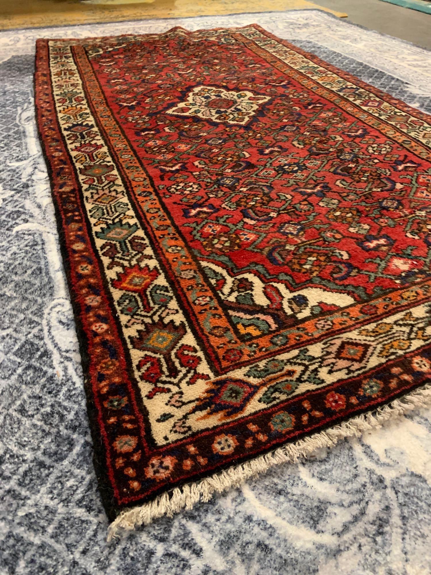 A Hamadan Rug, West Persia, wool on Cotton foundation. The red field with a central ivory rhombus - Image 2 of 7