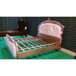 A bespoke king size bedframe the ornate hand carved frame and boards constructed of solid mahogany