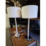 A pair of Porta Romana Huxley Table Lamps Leather and steel with patinated brass complete with