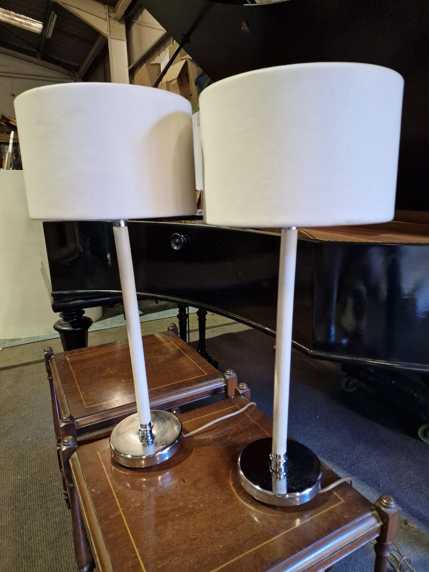 A pair of Porta Romana Huxley Table Lamps Leather and steel with patinated brass complete with