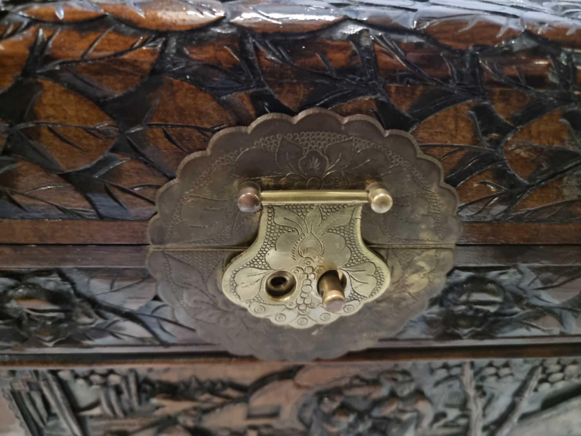 Early 20th Century Oriental Carved Camphor Wood Chest With Various Scenes Carved In Deep Relief. - Image 7 of 10