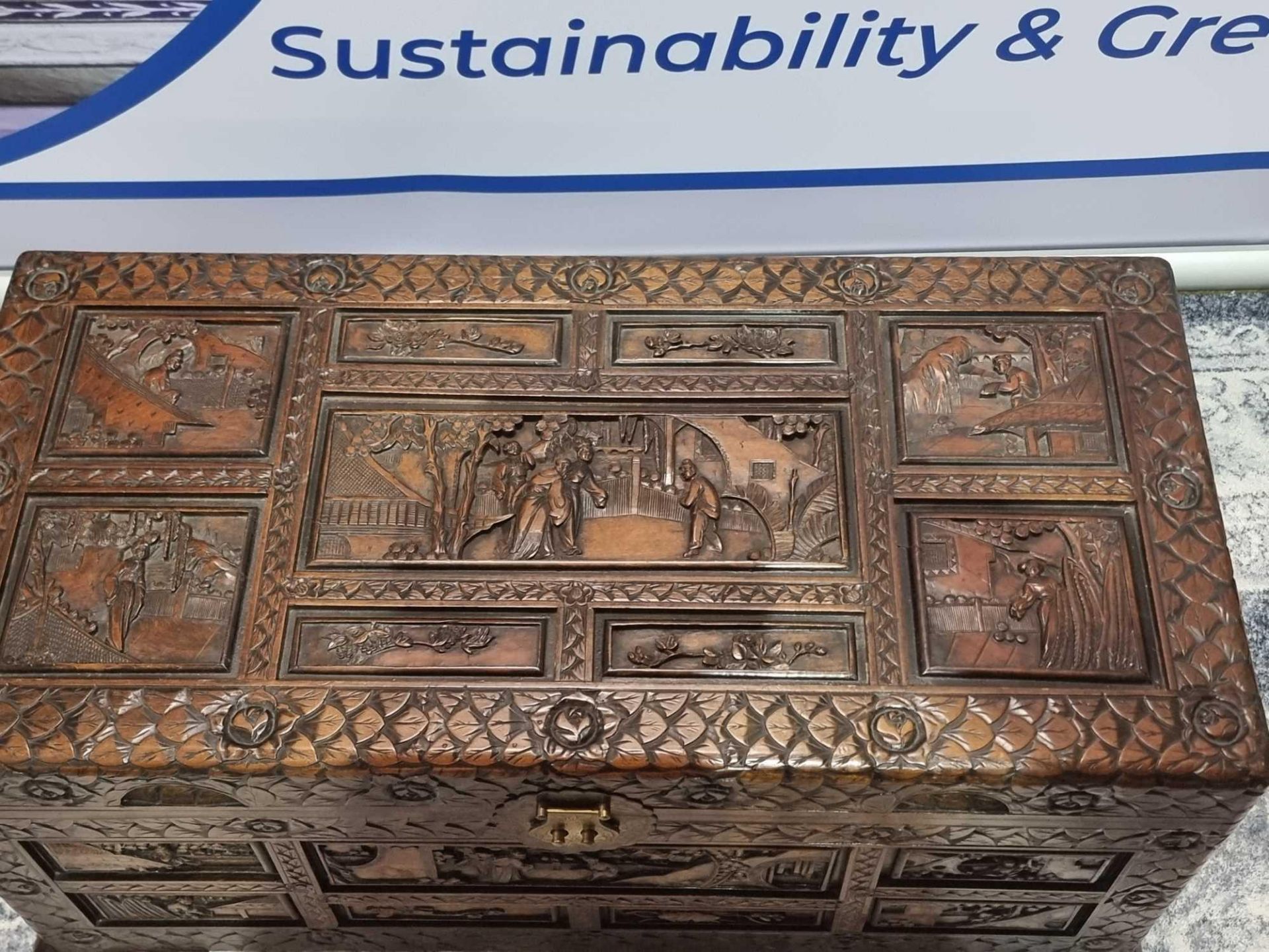 Early 20th Century Oriental Carved Camphor Wood Chest With Various Scenes Carved In Deep Relief. - Image 7 of 9