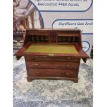 A George III Mahogany Fall Front Bureau With Fitted Interior And Four Graduating Drawers With