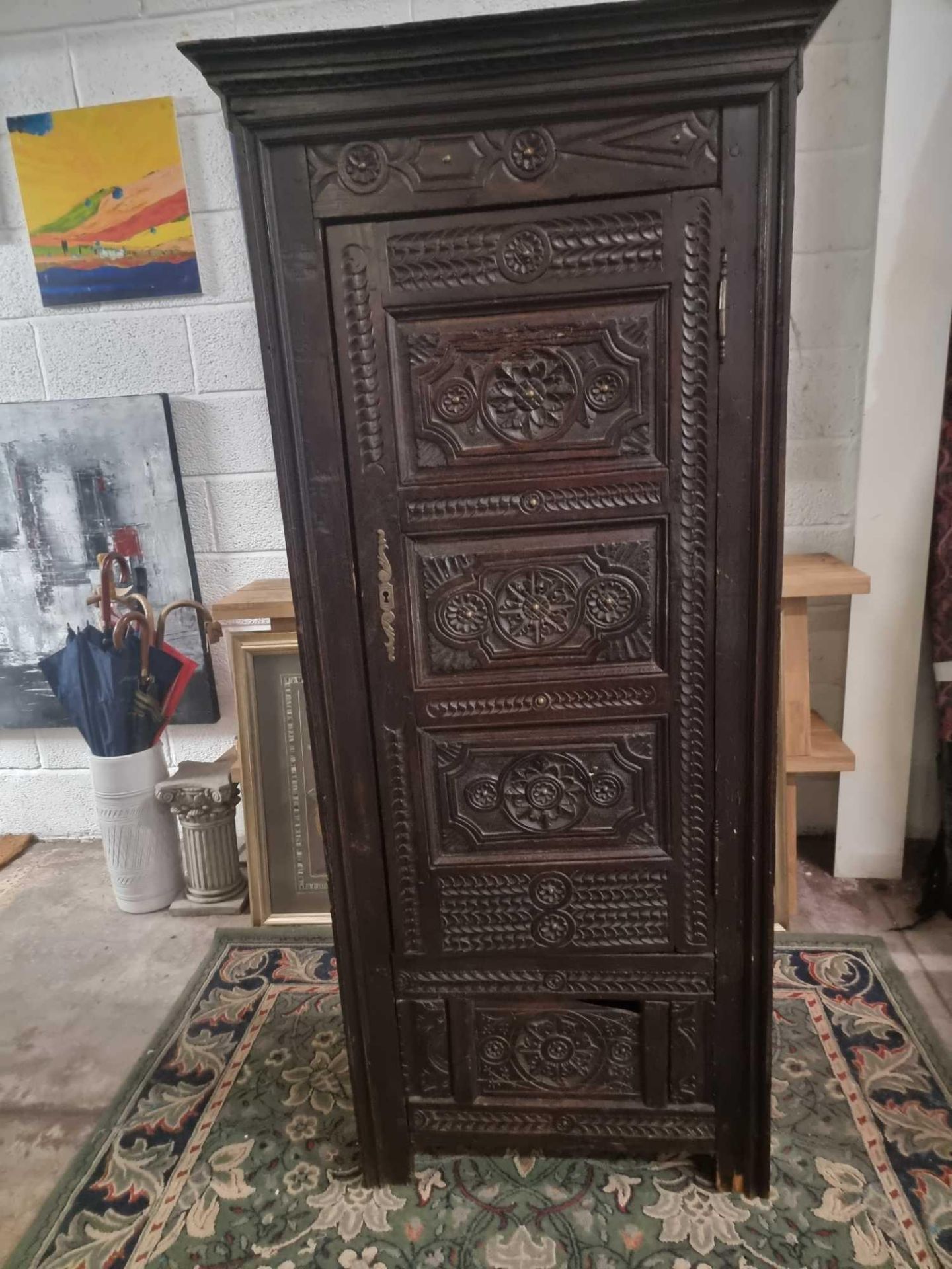 A Heavily Carved Oak Single Door C.18th Century French Bonnetiere Or Hat Cupboard Classic French