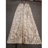 A pair of silk drapes gold with floral subtle pattern fully lined each panel 110cm wide x 310cm drop