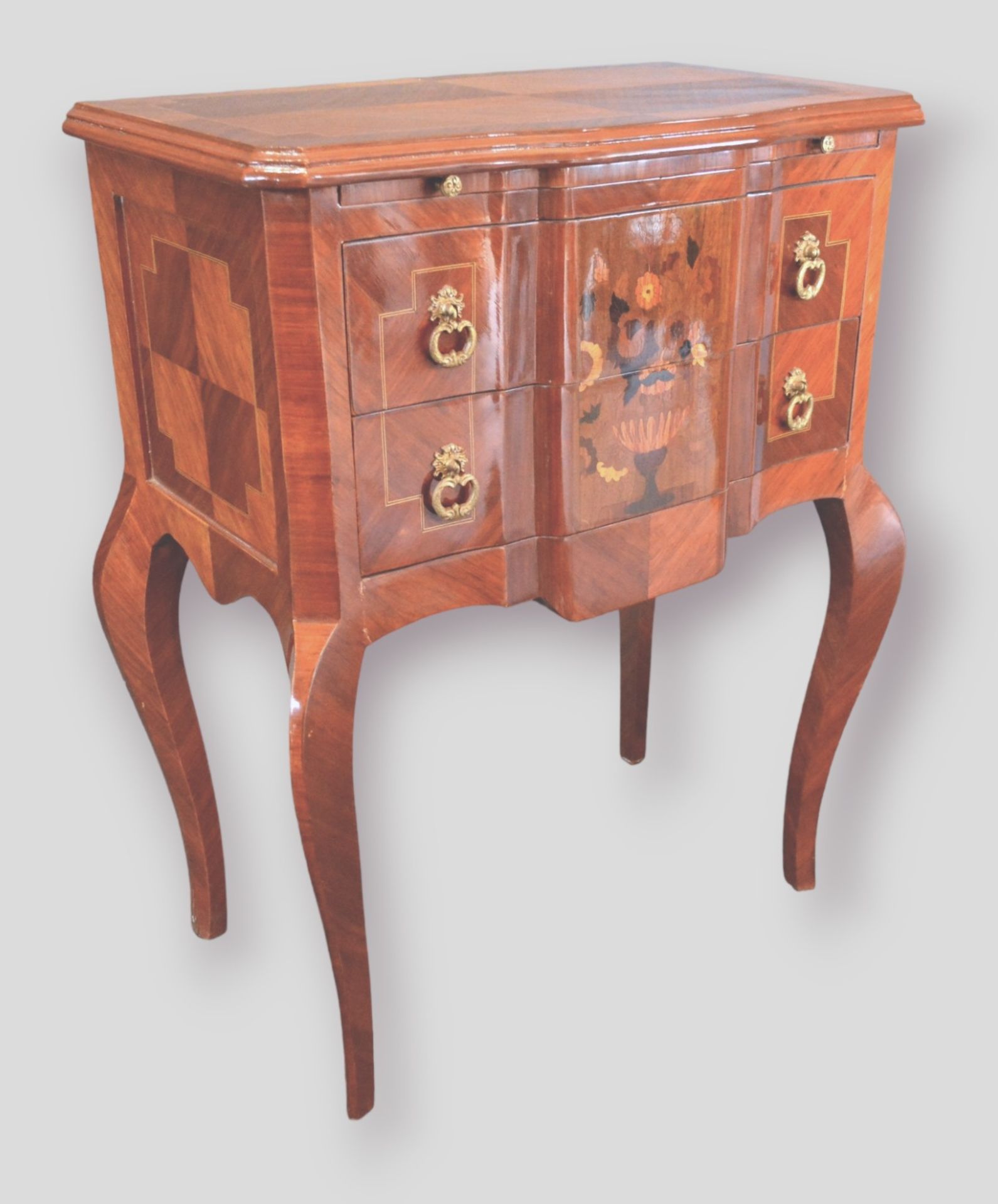 A Late Louis XV Style Rosewood Commode Chest, The Inlaid Shaped Top Above Two Marquetry Inlaid