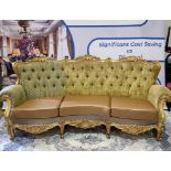 A Contemporary French Baroque Style Sofa The Gilded Ornate Frame Upholstered In Contrasting