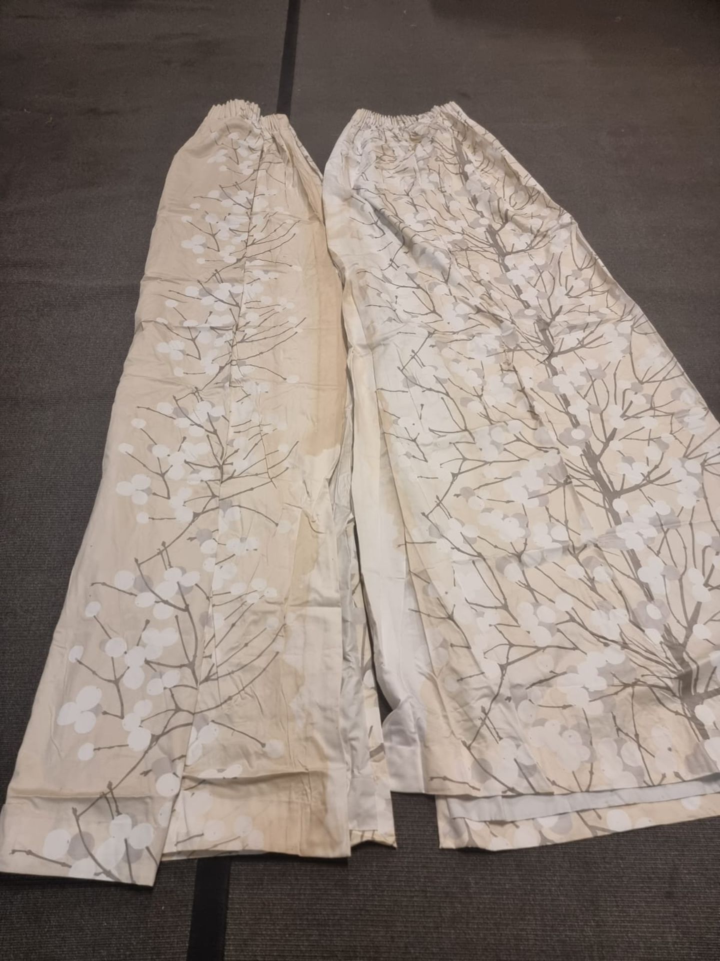 A pair of cream drapes silk with a budding tree pattern fully lined 90cm wide x 250cm drop [x2]