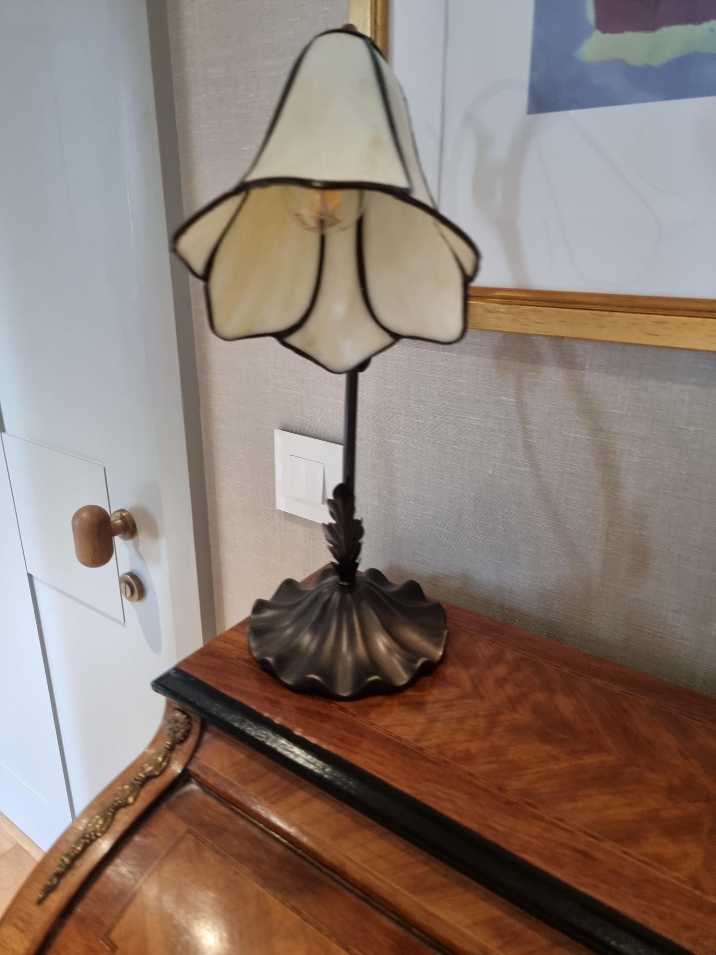 Judy Tiffany Table Lamp A classis swan neck Tiffany Lamp with a delightful floral design.