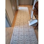 A cream and pastel pattern hallway runner rug 3.3m x 89cm  (Apt 1)