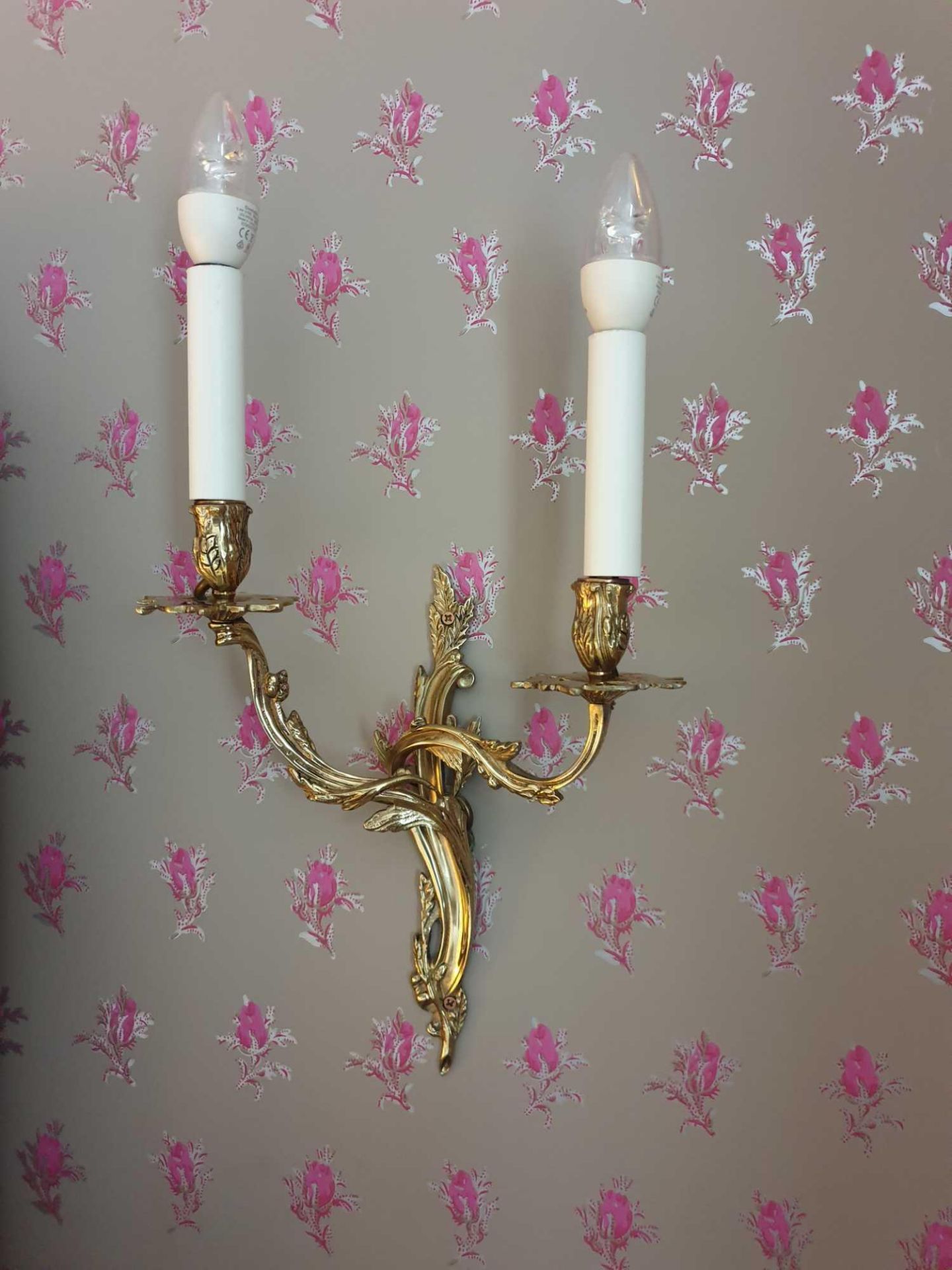 A Pair Of Louis XV Style Wall Appliques In Gilt Bronze With Two Candles Agrafe Decor On Which Are