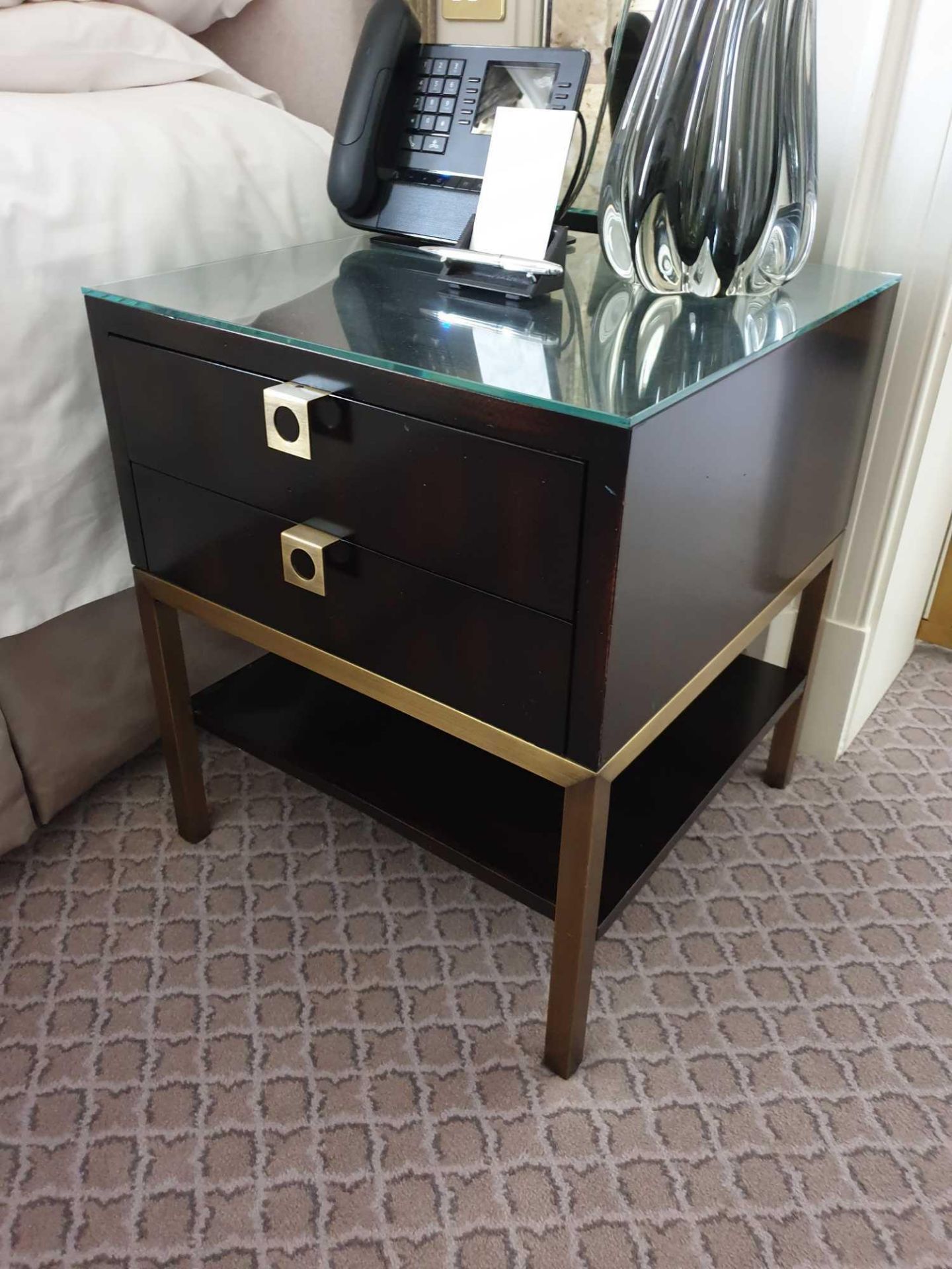 A Pair Of Night Stands Two Drawer With Bronzed Handle Pulls And Protective Glass Top 50 x 50 x