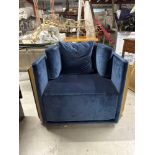 An Art Deco Inspired Armchair With Wrapped Wooden Detail To Back And Sides, Upholstered In Blue