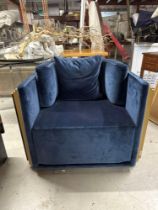 An Art Deco Inspired Armchair With Wrapped Wooden Detail To Back And Sides, Upholstered In Blue