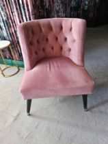 A single contemporary blush pink velvet lounge chair 64 x 62 x 83cm