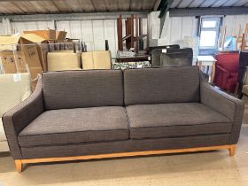 Large Upholstered Sofa In A Brown Chevron Patterned Upholstery With Dark Brown Piping On Oak Frame