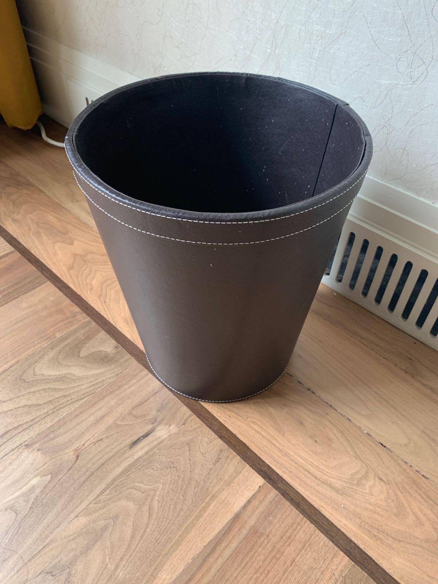 A Brown Leather Waste Paper Bin