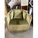 An Art Deco Inspired Armchair With Wrapped Wooden Detail To Back And Sides, Upholstered In Sage