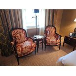 A Pair Of Bergere Chairs Black Wood Frame Upholstered In A Rust Red And Cream Damask Pattern With